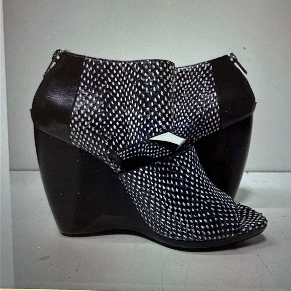 Balenciaga Black Heeled Ankle Boots with Textured Design